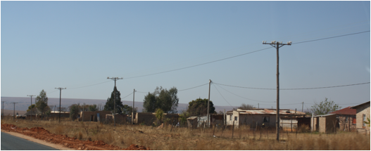 :South Africa pics:7-31 on the road shacks 347.jpg